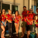 Trafficwerx NT Team members stood in a line wearing matching bright orange tropical shirts before the networking event.