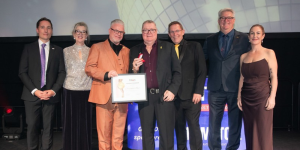 Chris Boyer is pictured on stage the TMAA Excellence Awards with other Honourable Members of TMAA for his work and dedication over the years.
