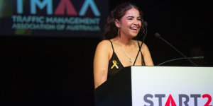 Tyra is on stage at the TMAA Excellence Awards accepting Indigenous Traffic Controller of the Year Award 2026