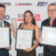 TMAA Excellence Awards, David, Tyra and Chris are stood with their awards