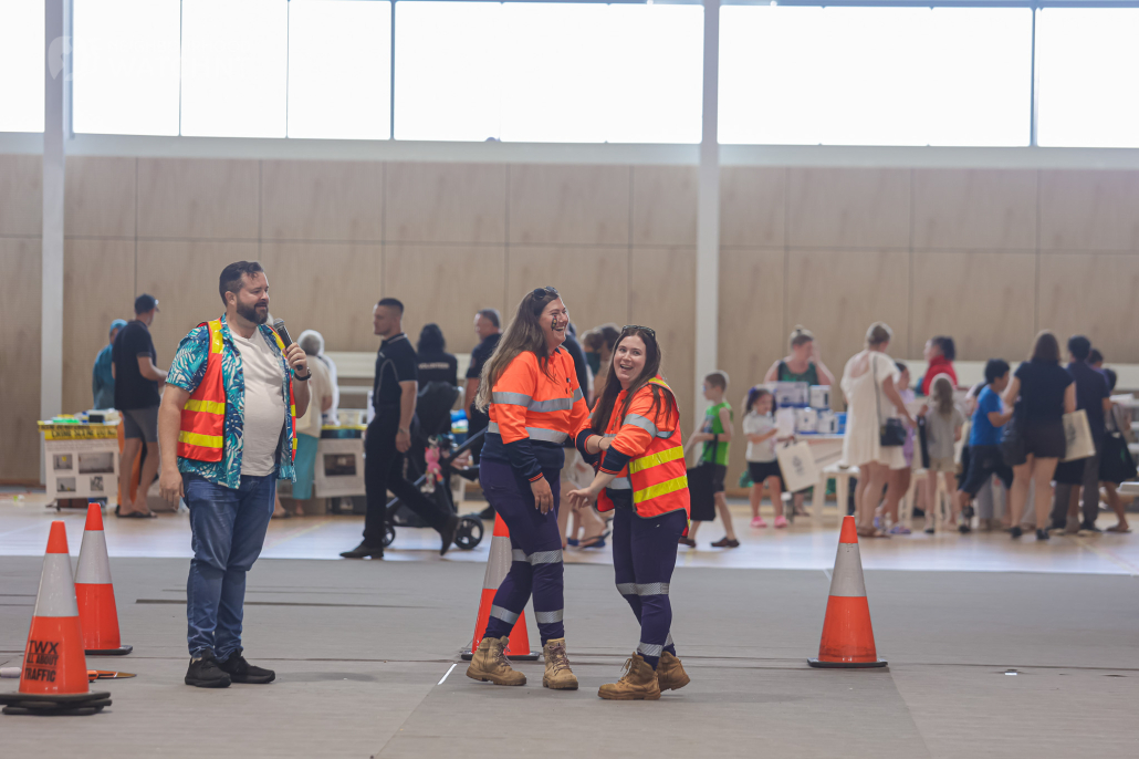 Two traffic controllers setting up a game at the Darwin Safety eExpo