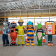 Safety mascots stand in a row at the Darwin Safety Expo